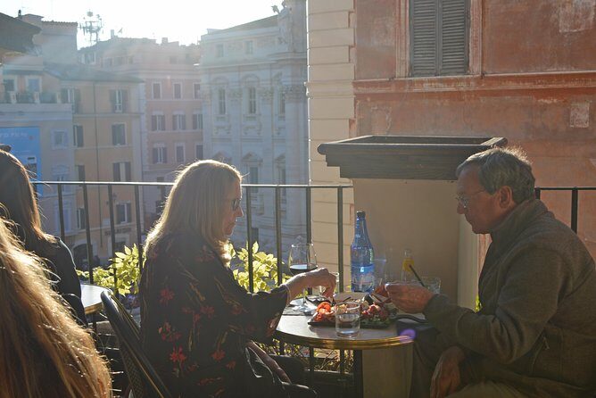 Rooftops of Rome by Night Food Tour with Dinner, Cocktails & Guided Sightseeing - Stop 2: The Trevi Fountain Rooftop for Cured Meat, Cheese, and Wine