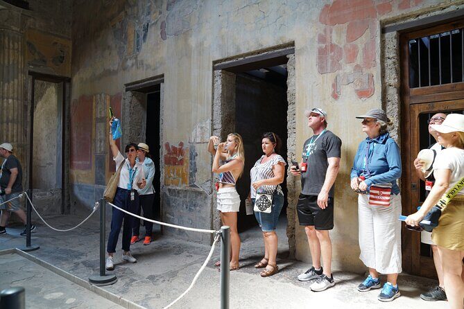 Skip-the-Line Pompeii Guided Tour from Naples - Via dell’Abbondanza: Pompeii’s main street, shops, and noise you can almost hear