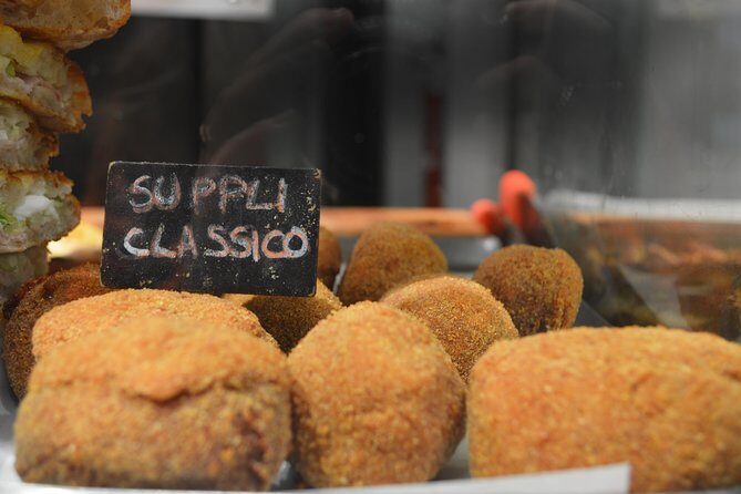 Tasty Trastevere Street Food Tour in Rome from Tiberine Island to Ponte Sisto - Piazza Trilussa: where the first wave of tastings hits