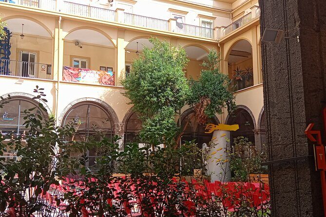 Tour of the Spanish Quarters and the monumental centre of Naples - Largo Maradona: a quick stop with real local devotion