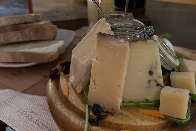 Trastevere Like a Local Food Tour with 7+ Food Tastings & Wines - Stop 1: Ponte Fabricio and the plague-temple legend