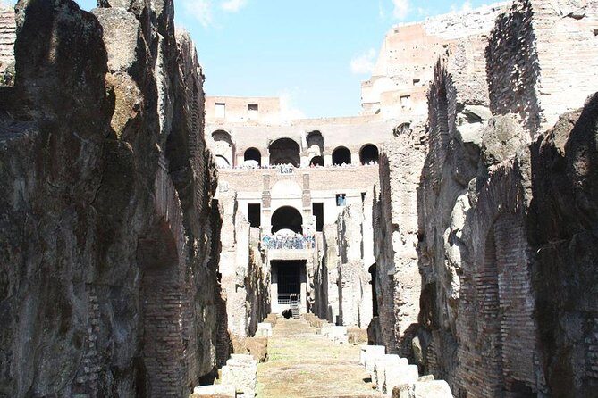 Undergrounds Areas Colosseum and Roman Forum Small Group Tour - Roman Forum and the Tomb of Julius Caesar: the politics part