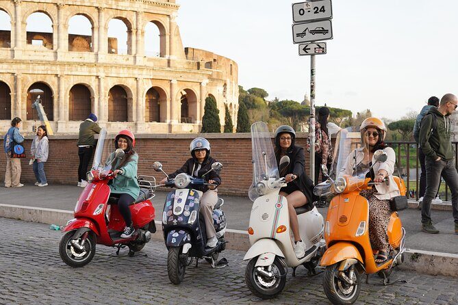 Vespa scooter Journey with Professional Photography - Colosseum and Piazza Venezia: fast access to the Rome you came for