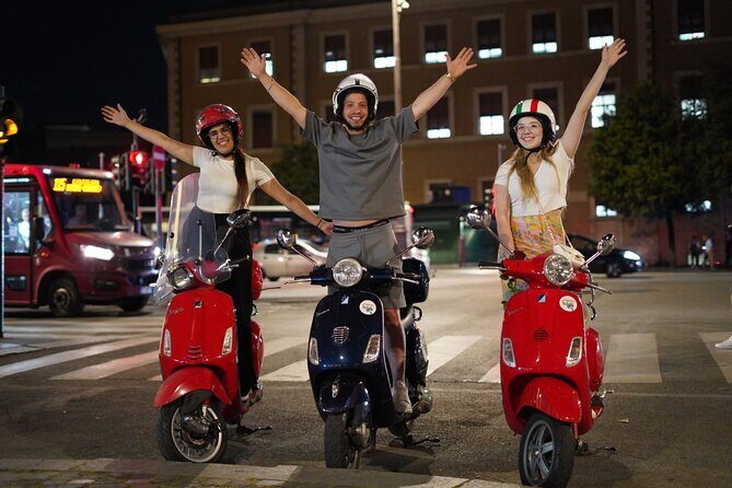 Vespa Scooter Night Tour in Rome with Professional Photographer - Meeting at Via del Colosseo and getting ready to ride