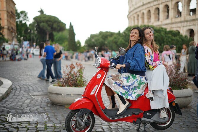 Vespa Tour in Rome with Pick up and Drop off - Piazza Venezia: Rome’s Central Square and the Monument Overhead